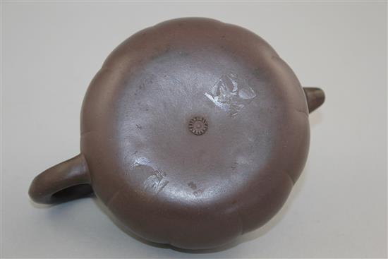 A Chinese Yixing melon-shaped teapot and cover, 19th / 20th century, length 18cm